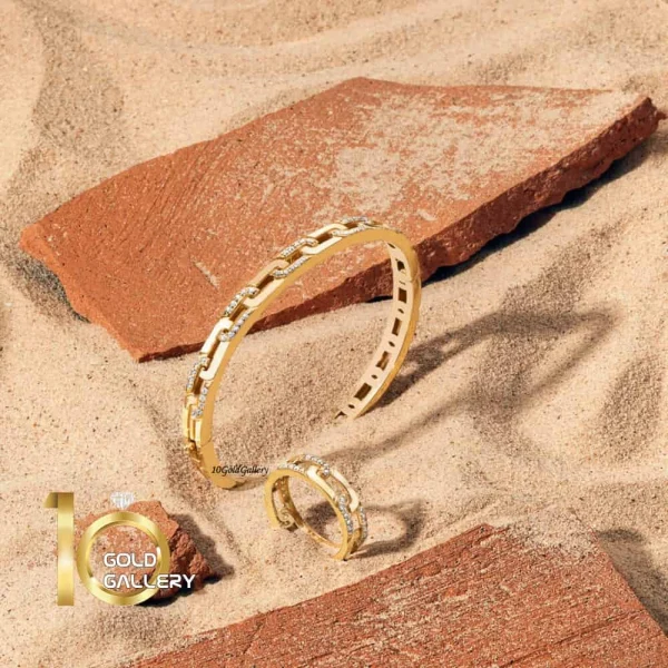 دستبند-النگویی-طلا-طرح-روبرتو-کوین-مدل-باریک-نگیندار