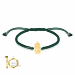 دستبند بافت کودک با پلاک طلا طرح شیشه شیر