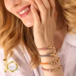 دستبند-چرم-با-پلاک-طلا-طرح-فراگامو